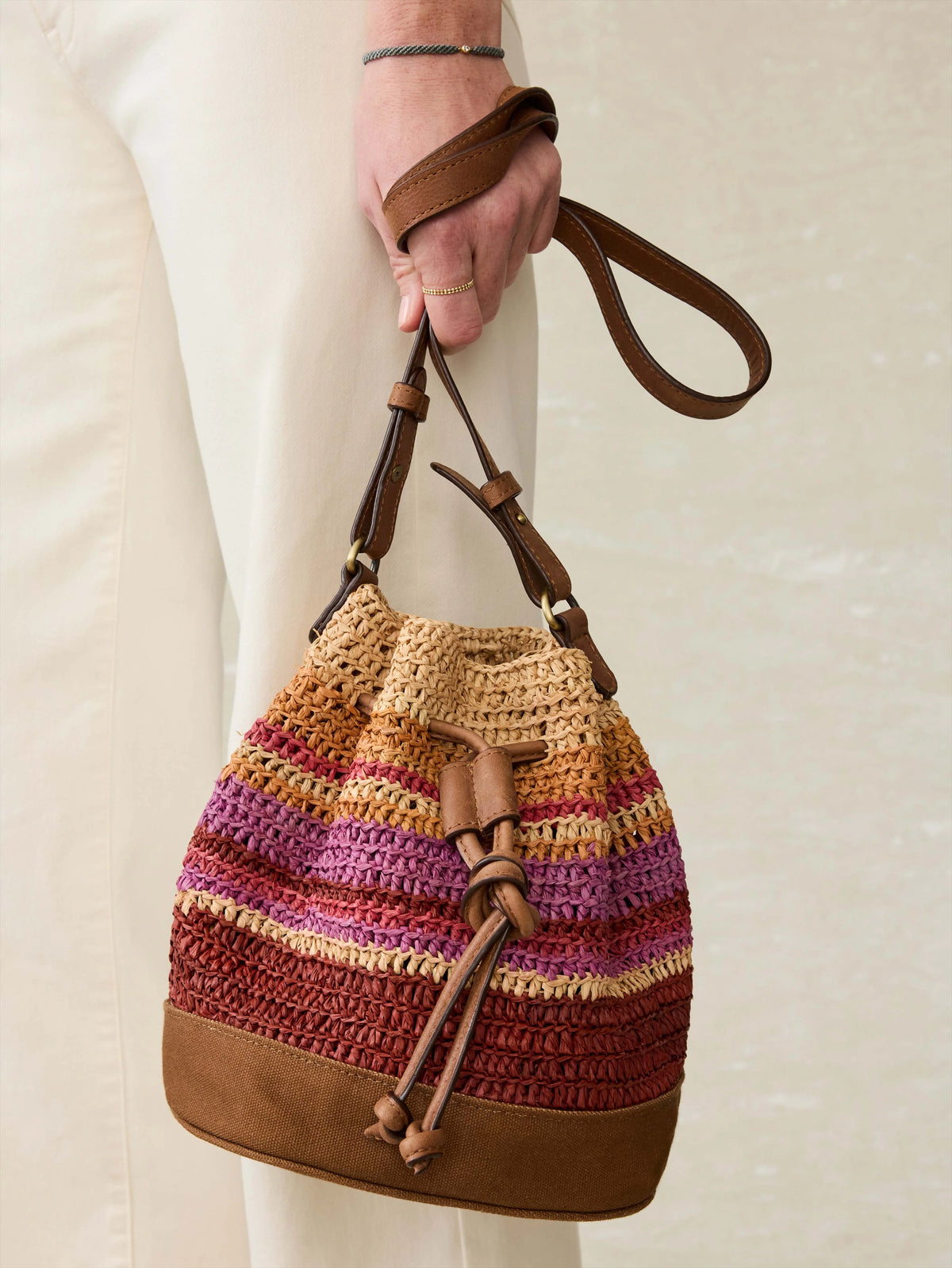 Striped Raffia Drawstring Bucket Bag - Sunrise Stripe Main image