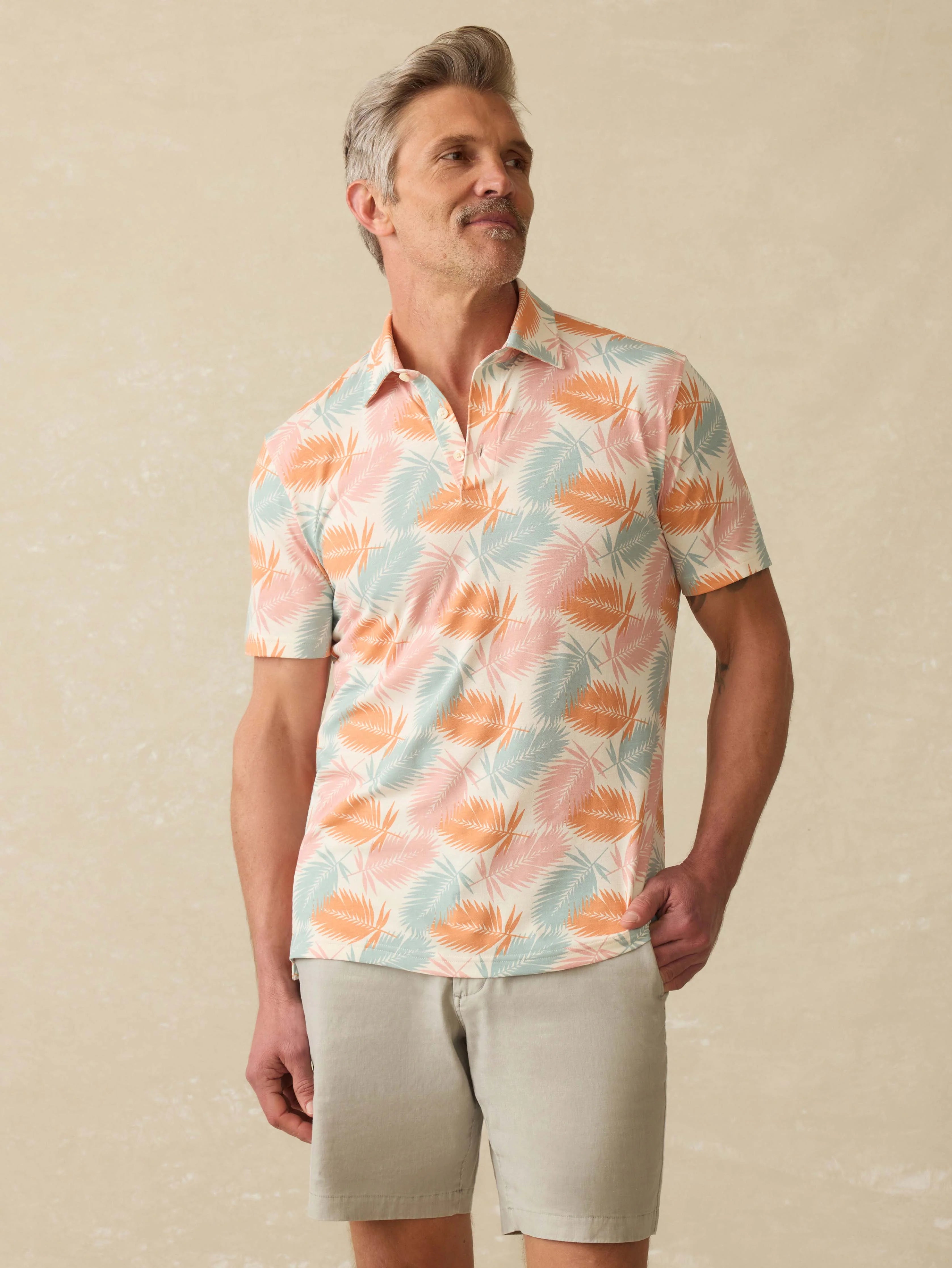 Short-Sleeve Movement™ Pique Polo - Ivory Paradise Palm Main image